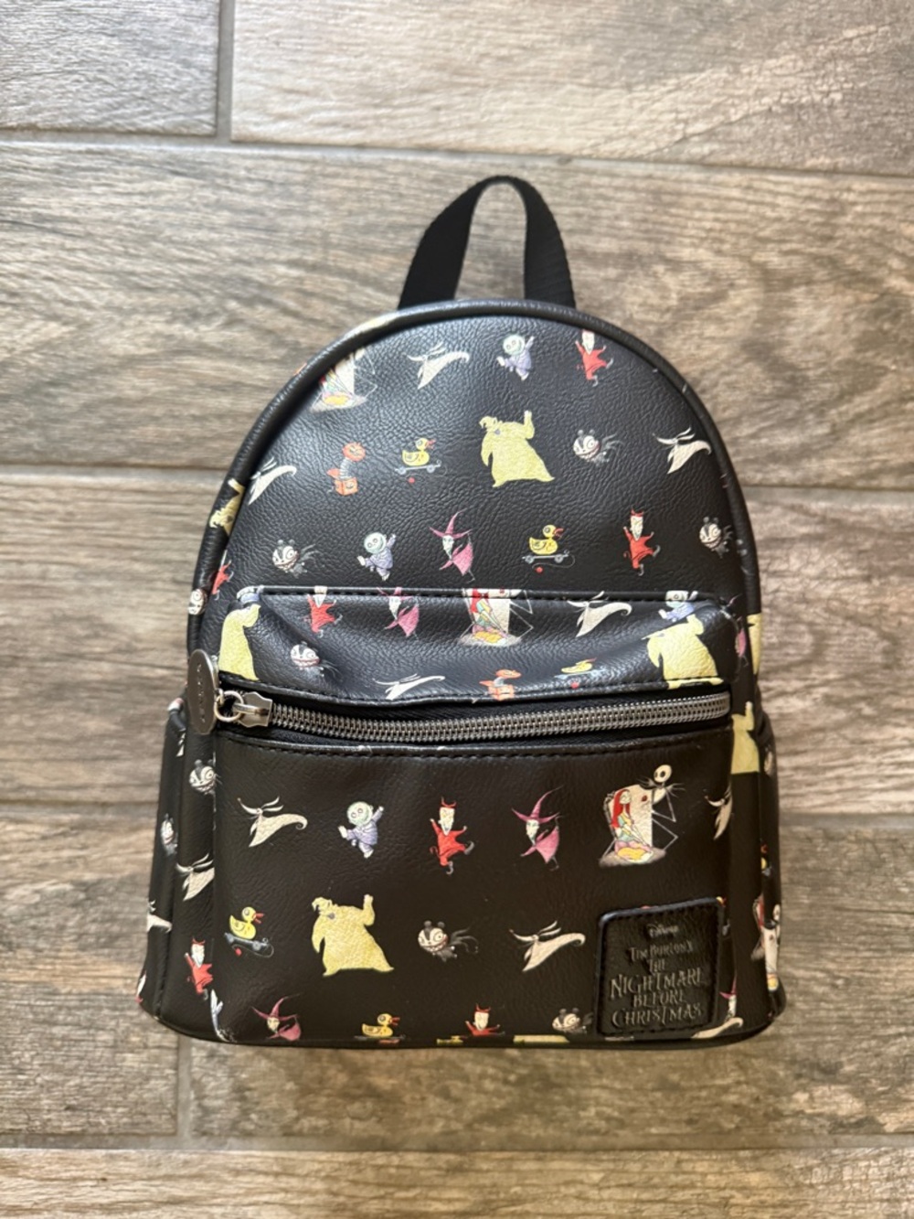 Disney Black Mini Backpack with Colorful Nightmare Before Christmas Motifs